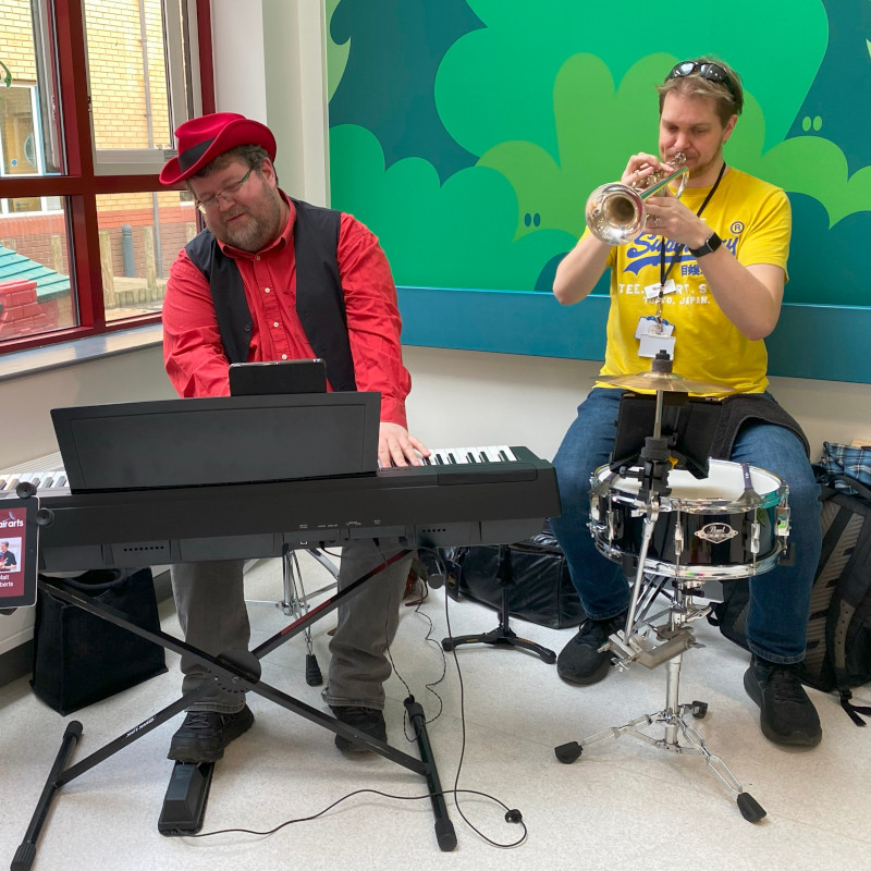 Tri Tones duo performing at UHDB Children's Ward for World Book Day