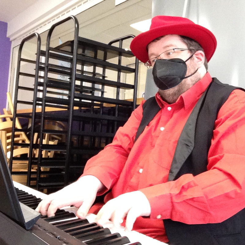 Christopher Lydon performing at UHDB Samuel Johnson Community Hospital café