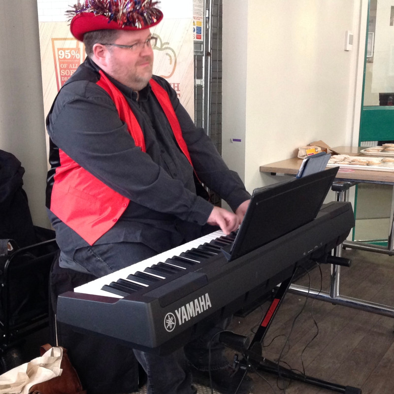 Christopher Lydon performing at NUH City Hospital Nottingham restaurant